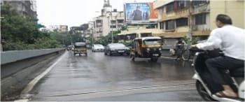 Advertising on Hoarding in Vile Parle