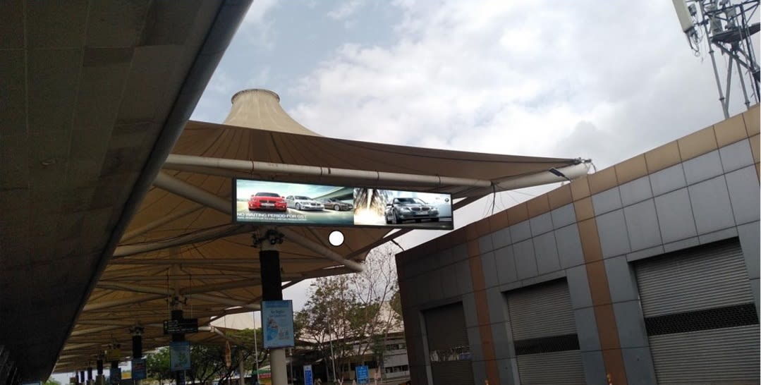 Pune Airport- Outside Area Advertising-Back Lit hanging Panel - Exit gate under Shade Area - 20 W x 4 H Ft