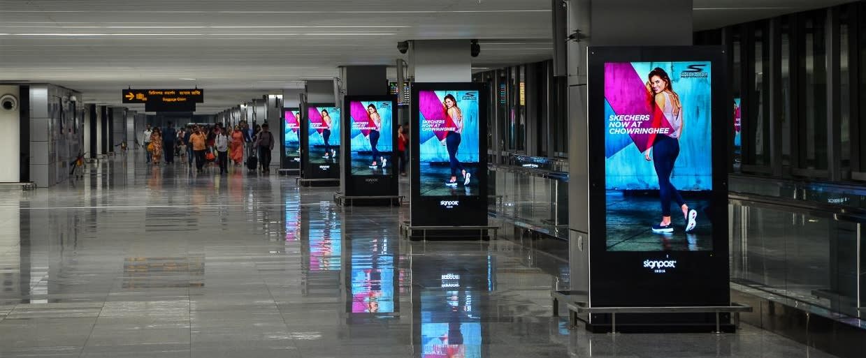 Kolkata Airport-Digital Pods Advertising  - Arrival Hall, Near Conveyor Belt  And Exit Gates - 65 Inch