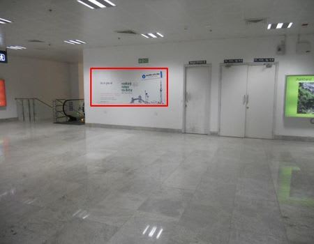 Arrival Lounge Before Escalator Wall - 10 x 4 ft