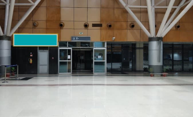 Arrival Area - Main Hall Exit Gate Above left  - 10 x 3 ft - Back Lit Panel