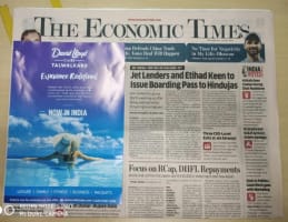 Delhi Airport- Newspaper Stickers Economic Times Advertising