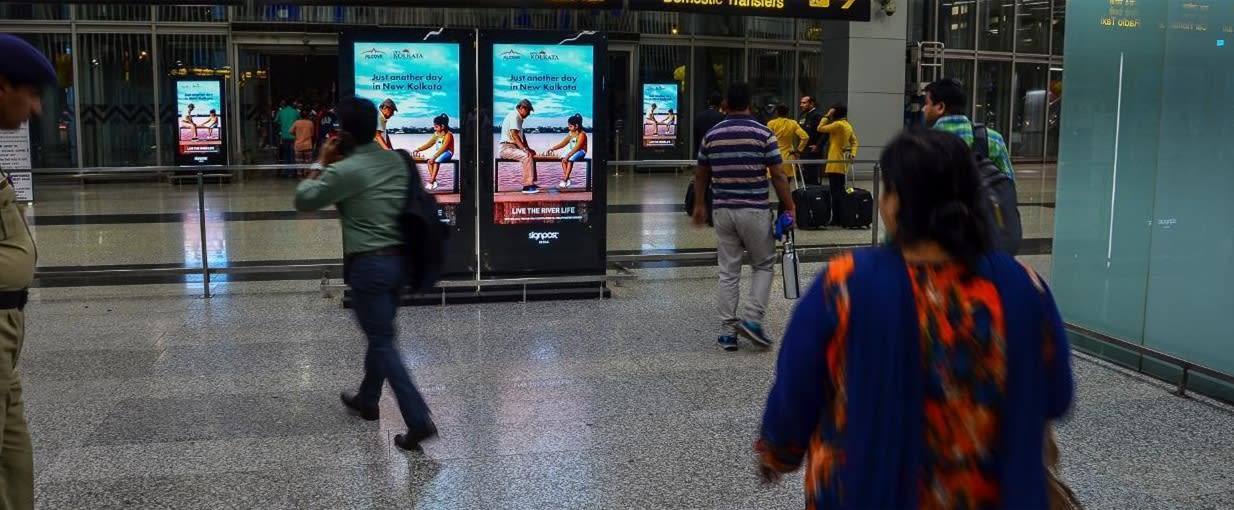 Kolkata Airport-Digital Pods Advertising - Arrival Hall, Near Conveyor Belt  And Exit Gates - 65 Inch