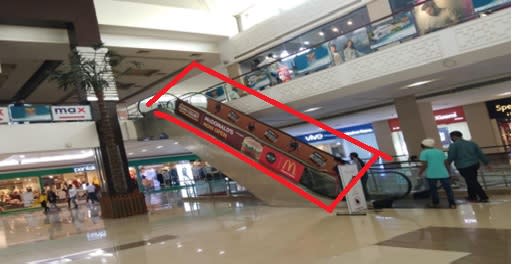 Escalator Branding 20 W x 2 H Ft Inside Mall 2.jpg