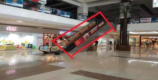 Escalator Branding 20 W x 2 H Ft Inside Mall.jpg