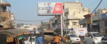 Advertising on Hoarding in DLF Colony  69703