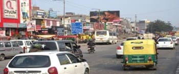 Advertising on Hoarding in Khazoori Khas  83981